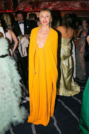 Sienna Miller in a yellow dress at Save Venice