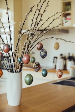 hanging origami-wrapped eggs on pussy willow branches is a lovely easter tree idea