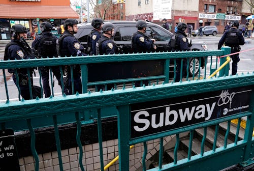 NYPD officers outside a Brooklyn subway station on April 12, 2022.