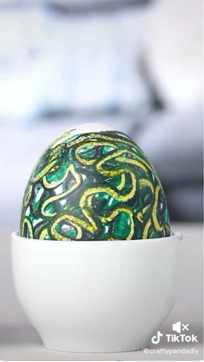You can get some Easter egg designs using melted crayons like this TikTok method.