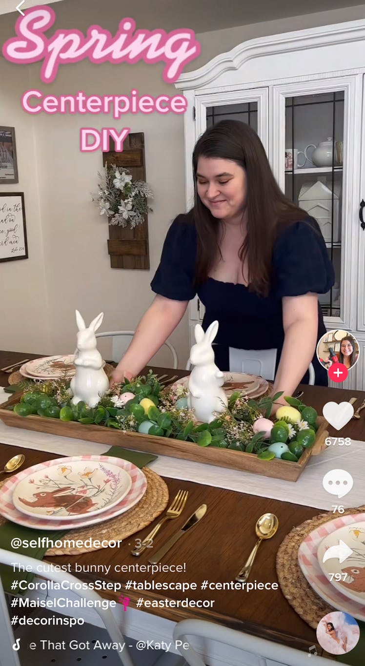 A woman shows off an Easter centerpiece for her Easter tablescape as part of Easter decor for your h...