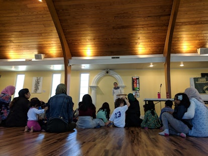 A group of people ready for prayer in a mosque