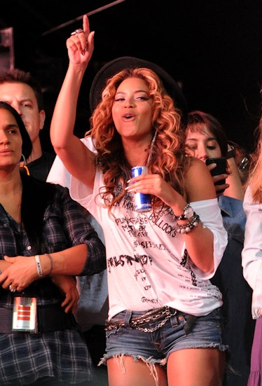Beyoncé holding a Red Bull at the 2010 Coachella