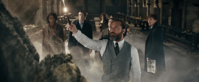Jude Law holding a stick as Albus Dumbledore in "Fantastic Beasts 3"