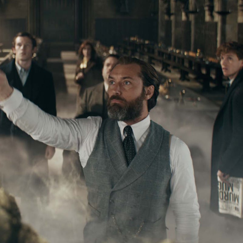 Jude Law holding a stick as Albus Dumbledore in "Fantastic Beasts 3"