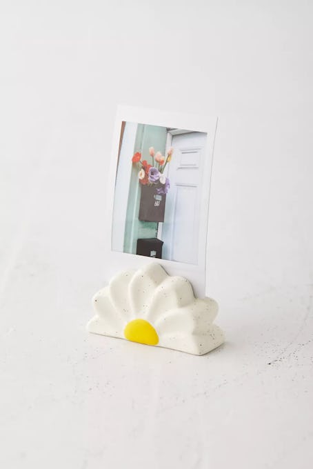 High school graduation gifts include this polaroid photo stand.