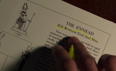 Steven Grant researches the Ennead in Moon Knight Episode 1.