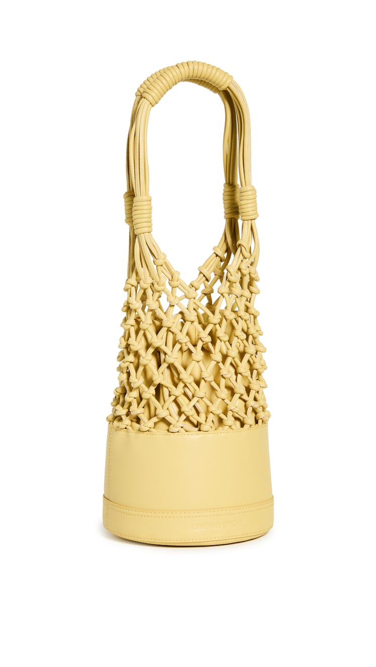 2022 vacation trends bright bags yellow drawstring crochet bucket bag