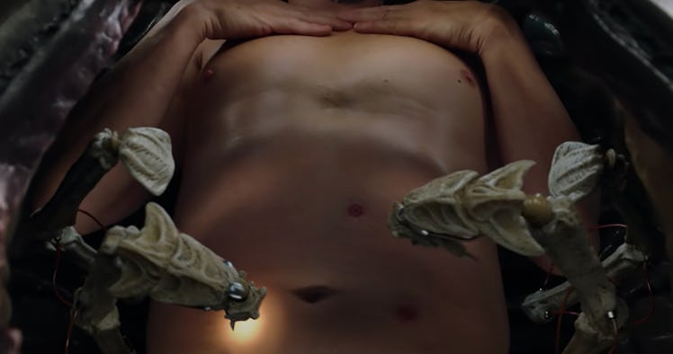 Robot arms examine Viggo Mortensen's stomach in the first Crimes of the Future trailer