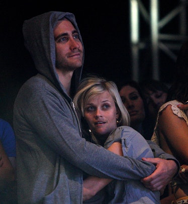 Jake Gyllenhaal and Reese Witherspoon watching Jenny Lewis perform at Coachella