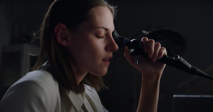 Kristen Stewart looking through a device in the first Crimes of the Future trailer