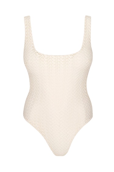 swimwear trends 2022 textured white crochet one piece 
