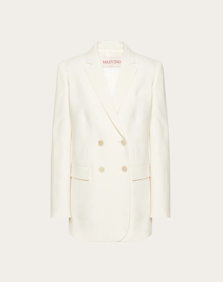This cream-colored wool blazer from Valentino is a Meghan Markle-approved piece.