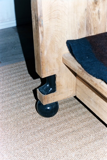 the foot of a rooms studio piece of furniture