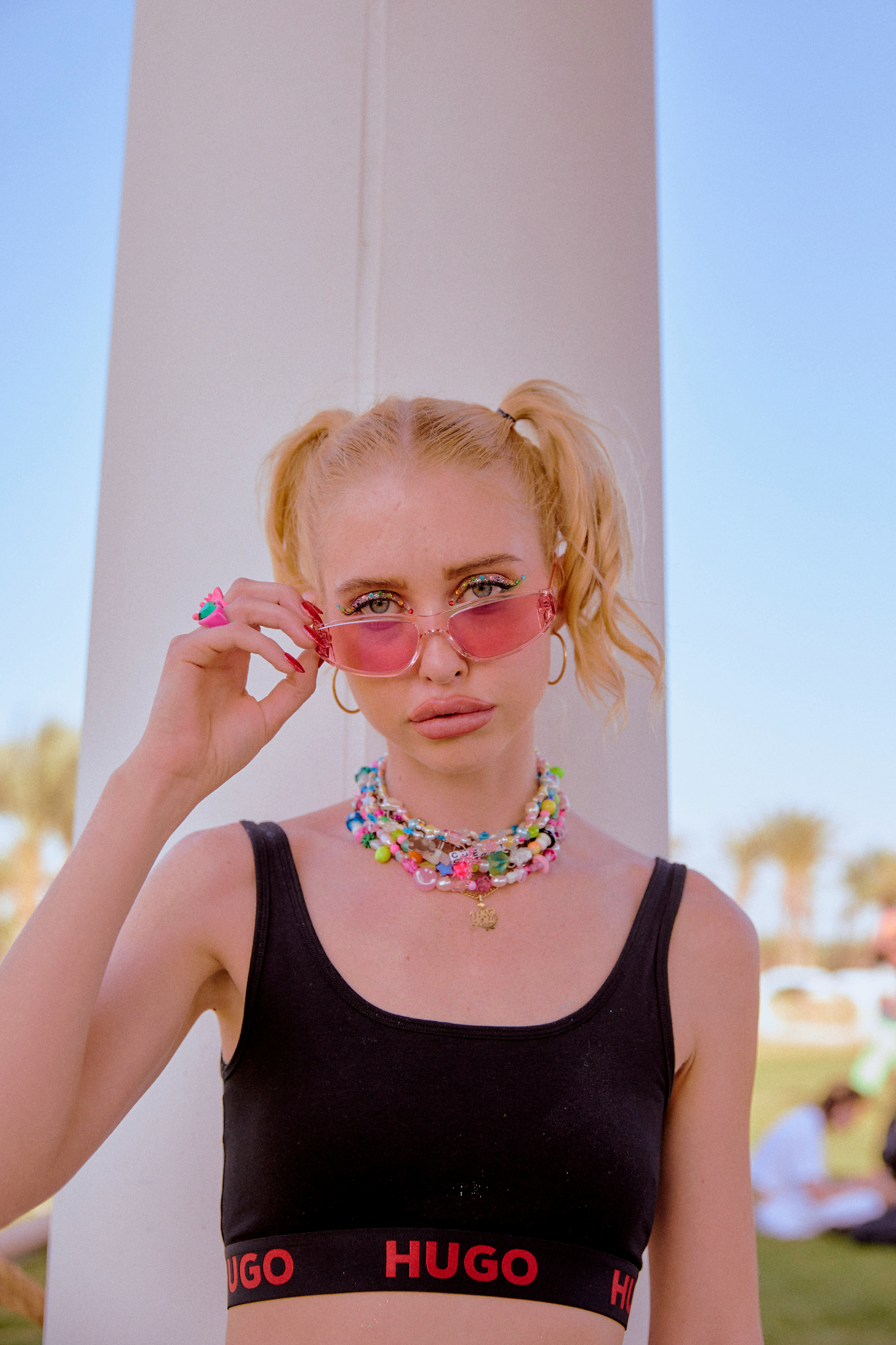 Chloe Cherry celebrates at the HUGO x Soho Desert House pop-up during Coachella on April 16.