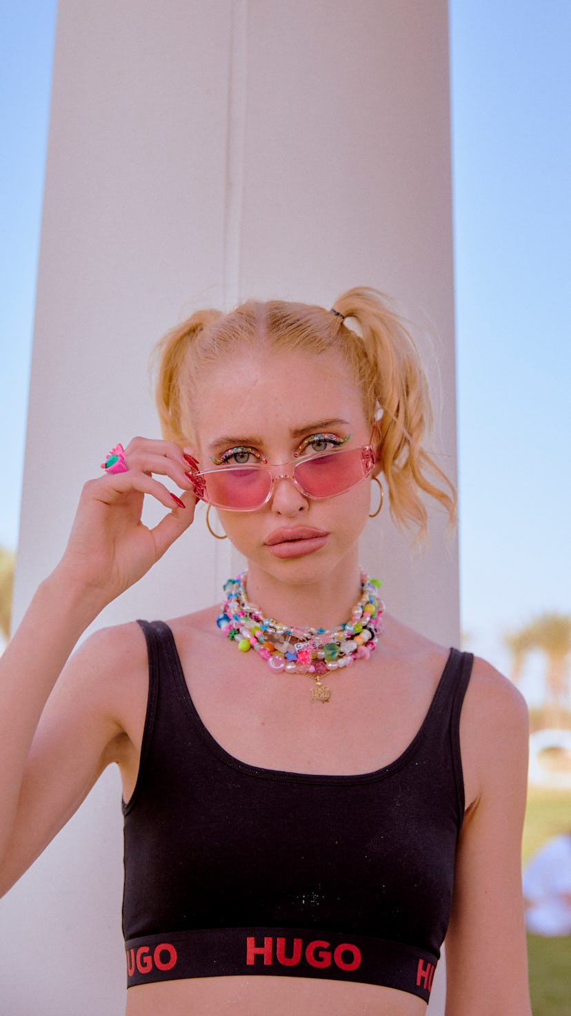 Chloe Cherry celebrates at the HUGO x Soho Desert House pop-up during Coachella on April 16.