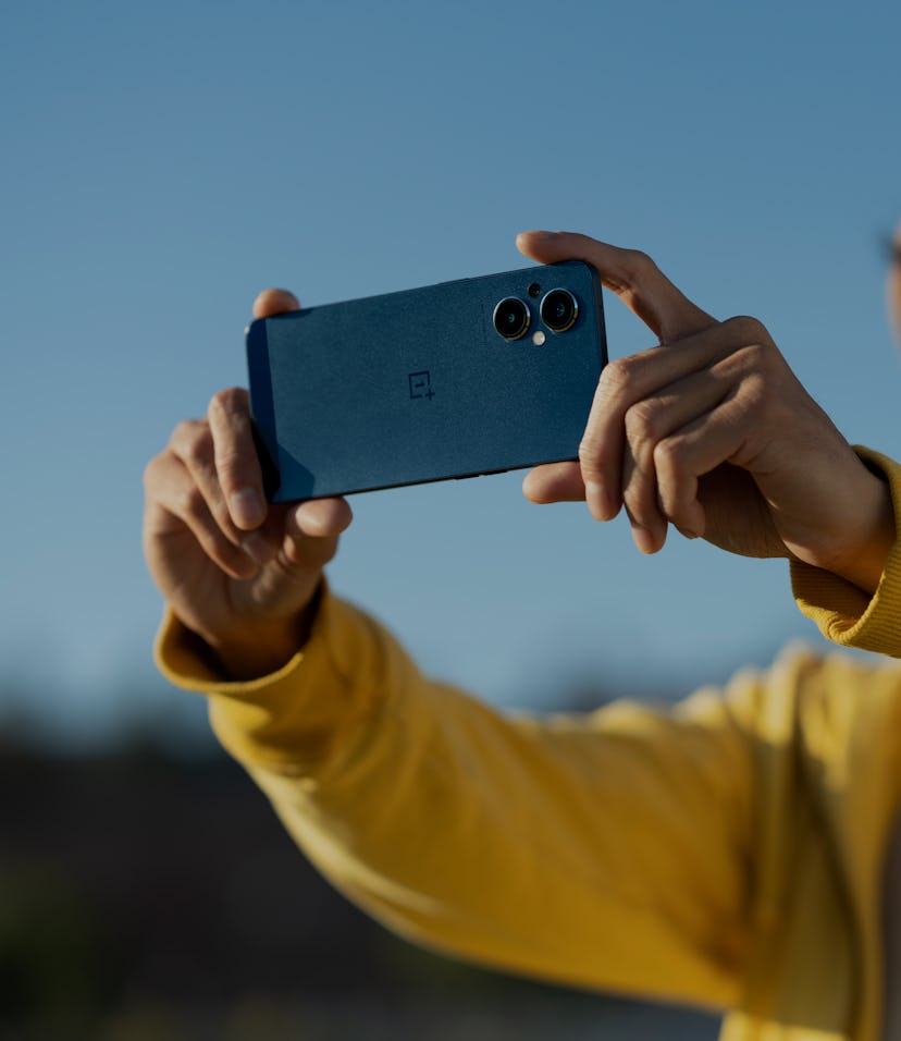 The OnePlus Nord N20 5G in a person's hands showing off the dual cameras