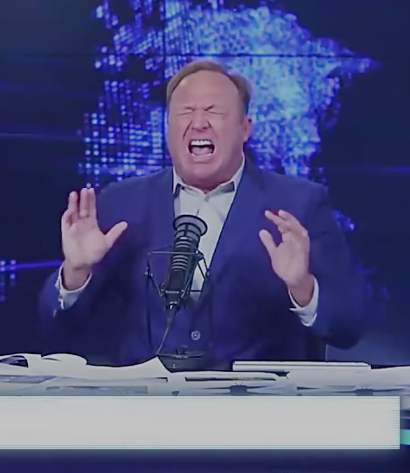 Alex Jones Infowars screaming behind desk screenshot