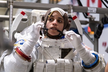 jessica watkins in an astronaut suit in a training facility