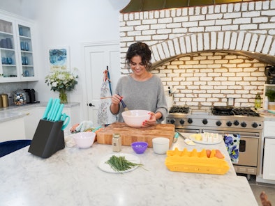 Selena Gomez's kitchen decor tips include having pastel utensils. 