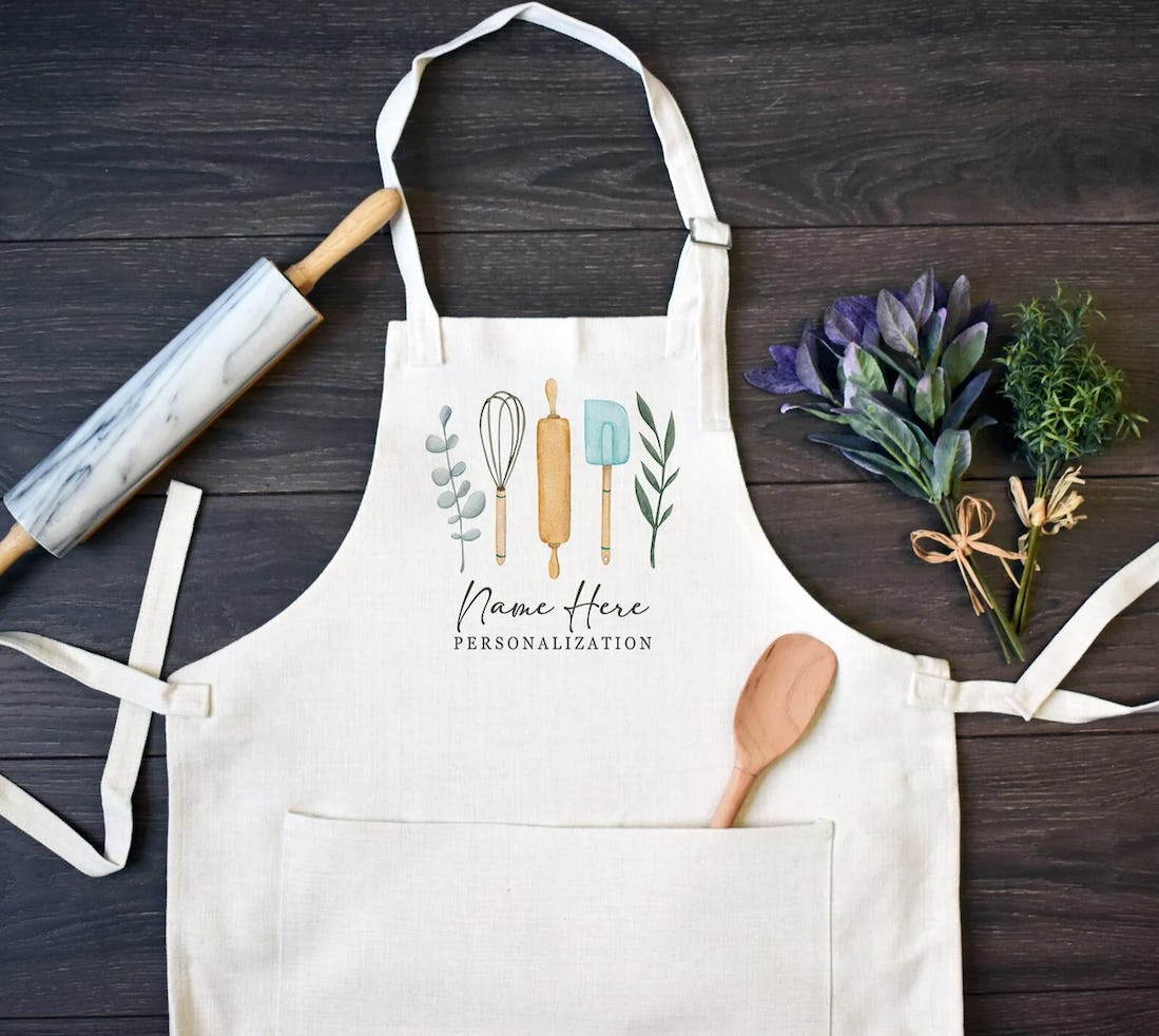 Etsy shop @Whiprint Linen apron with baking utensil graphic and name option