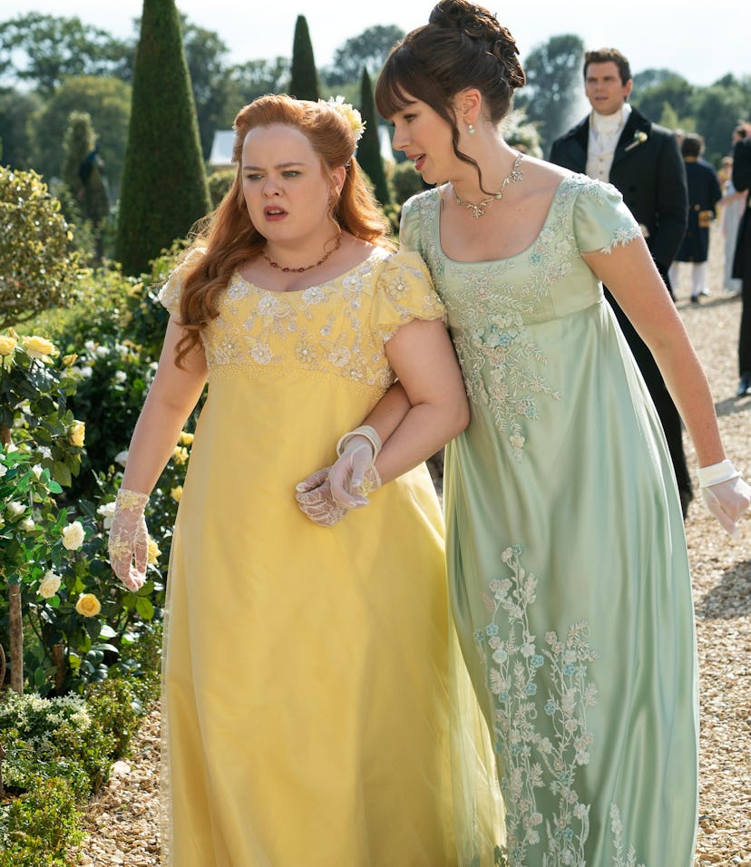 Nicola Coughlan as Penelope Featherington and Claudia Jessie as Eloise Bridgerton in Season 2 of 'Br...