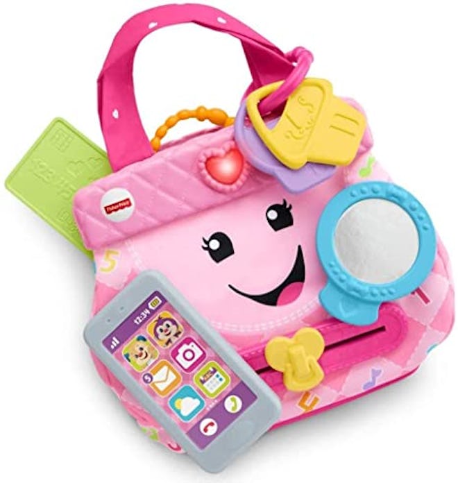 This purse is among the best toys for 9-month-olds because it teaches zipping, button pressing, and ...