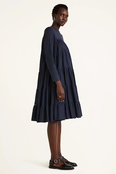 Non-Maternity Dress Brands Merlette navy blue tiered midi dress with eyelet trim