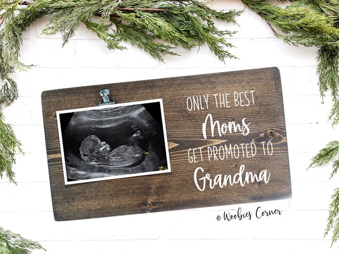 One Mother's Day baby announcement idea is to gift a frame to your mom that reads, "Only the best mo...