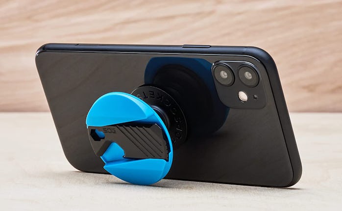 Cyan PopSockets: PopGrip SOG Multi-Tool attached to iPhone