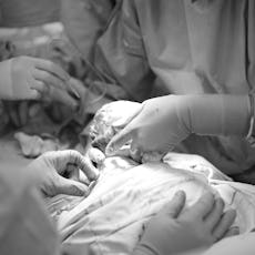 Doctors performing a C-section 