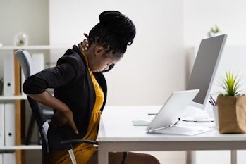 woman with bad posture in a chair