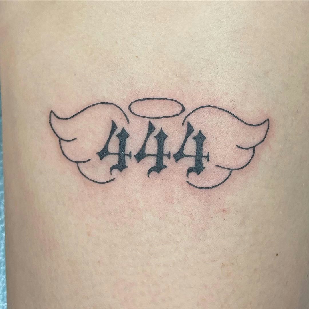 Number 444 tattoo located on the thumb