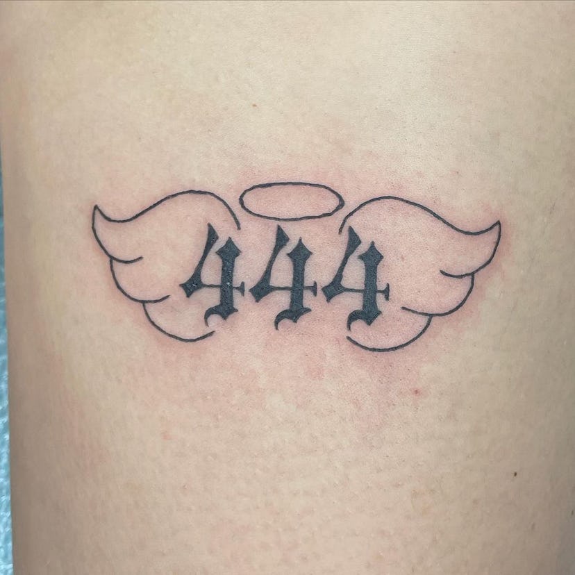 Consider adding angel wings to your 444 tattoo.