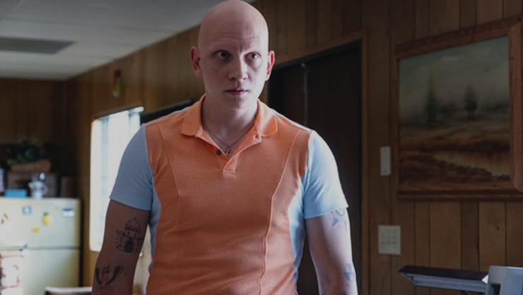Anthony Carrigan in an orange and light blue polo shirt in Barry Season 3
