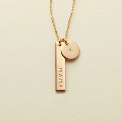 This pretty bar necklace reads "Mama" and is a great gift idea for a pregnant wife on Mother's Day.