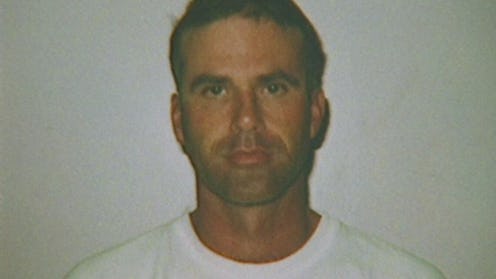 A photo of Cary Stayner as an adult. He wears a white t-shirt and stands in front of a white backgro...