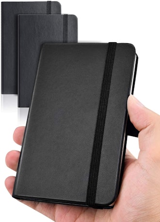 Black pocket notebook with lined pages