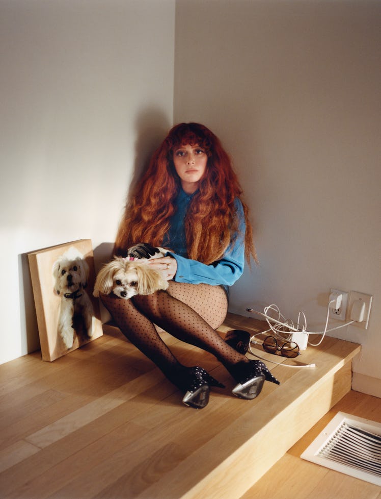 Natasha Lyonne, with her dog, Rootbeer. Lyonne wears a Saint Laurent by Anthony Vaccarello shirt; Gu...