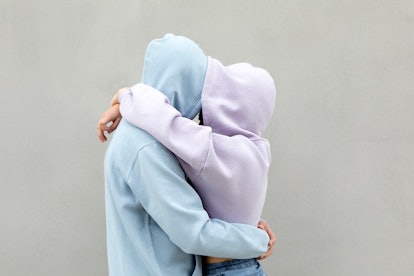 friends hugging, show support with these quotes about infertility