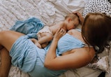 breastfeeding photoshoot ideas of mom and baby laying down