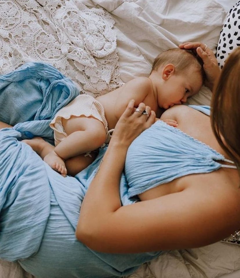 breastfeeding photoshoot ideas of mom and baby laying down