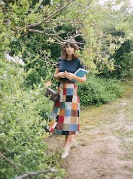 model wearing patchwork denim skirt