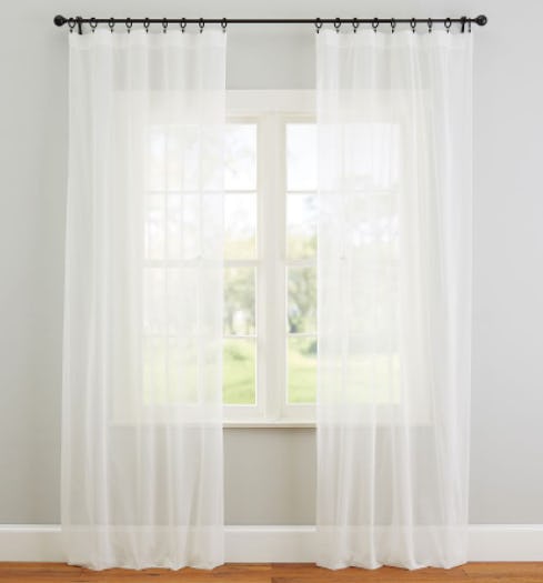 Classic voile sheer curtains in crisp, clean white for brightening up a room
