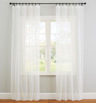 Classic voile sheer curtains in crisp, clean white for brightening up a room