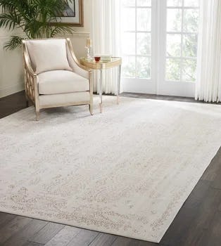 Rectangular abstract ivory area rug for adding light to dark floors