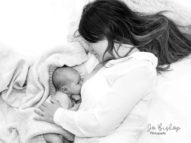 breastfeeding photoshoot ideas of mom laying with baby