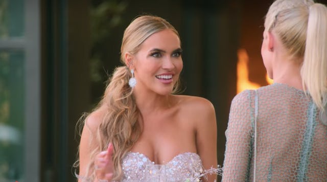 Chrishell Stause speaks with another realtor.