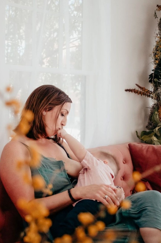 breastfeeding photoshoot ideas of mom and baby playing