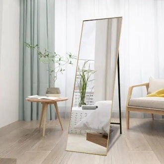 Full-length standing mirror to make a room feel and appear more open